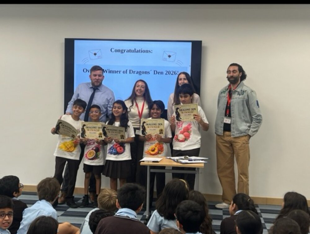 Team receiving the Grand Final win on stage